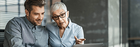 Social media icons floating around a smartphone, representing social media marketing